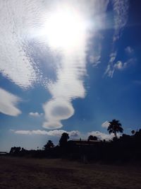 Scenic view of landscape against cloudy sky