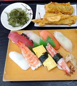 High angle view of sushi served on table