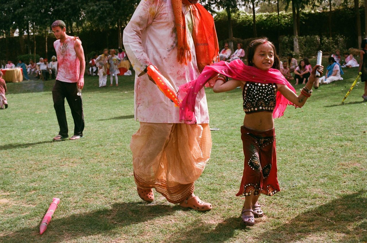 lifestyles, leisure activity, grass, casual clothing, childhood, park - man made space, full length, girls, togetherness, fun, men, person, enjoyment, playing, park, field, boys
