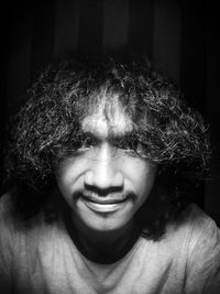 Close-up portrait of a smiling young man