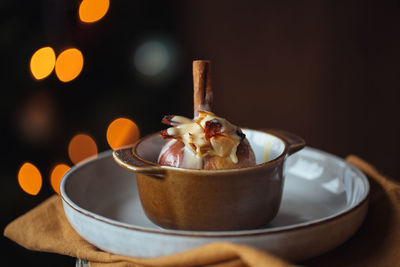 Close-up of baked apple on plate