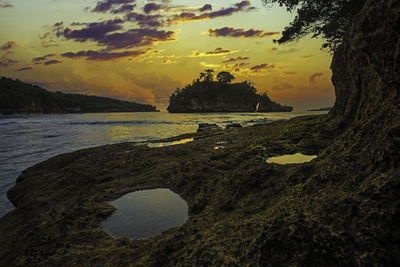 Scenic view of sea against sky during sunset