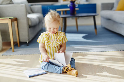 Girl sitting with book