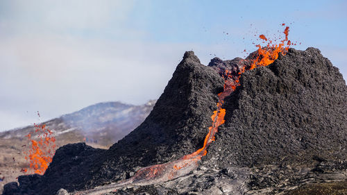 Panoramic view of volcanic mountain against sky