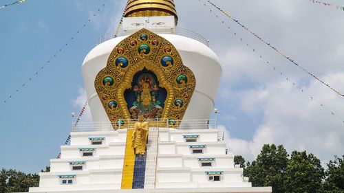 Low angle view of buddhist stupa against sky