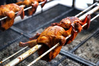 Close-up of meat on barbecue grill