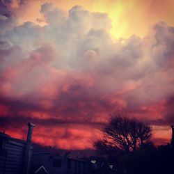 Low angle view of cloudy sky at sunset