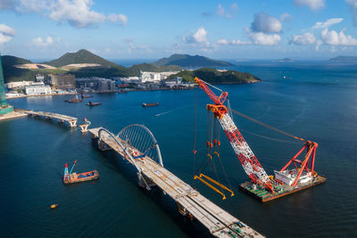 High angle view of commercial dock against sky