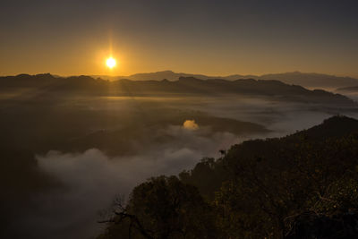 Scenic view of mountains against sky during sunset