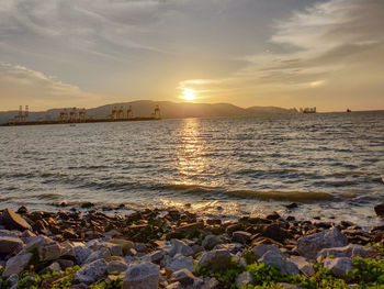 Scenic view of sea against sky during sunset