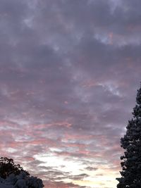 Low angle view of dramatic sky during sunset