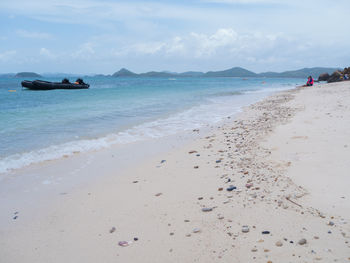 Scenic view of beach against sky