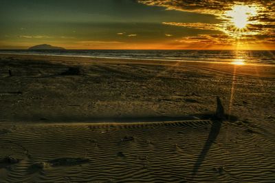 Scenic view of sea at sunset