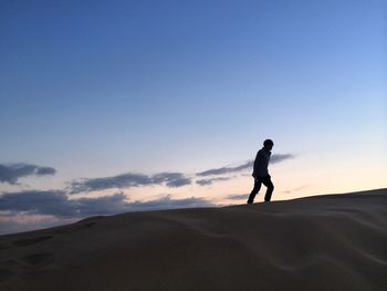 Woman jumping on landscape