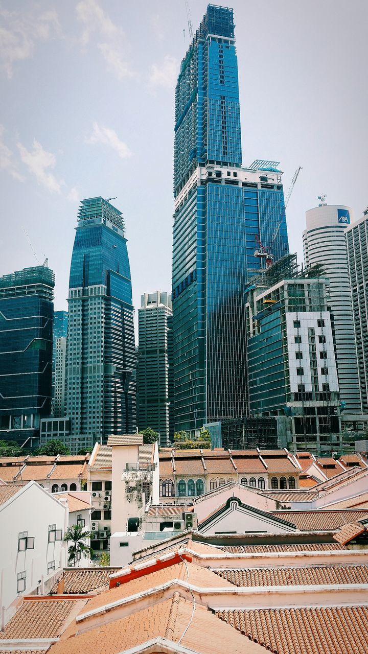 building exterior, architecture, built structure, city, skyscraper, modern, office building, tall - high, tower, sky, building, cityscape, city life, low angle view, tall, residential building, day, outdoors, blue, no people