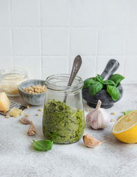 Fresh made pesto sauce. green basil pesto. ingredient for pesto sauce 