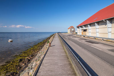 Scenic view of sea against blue sky