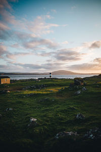 Scenic view of landscape against sky during sunset