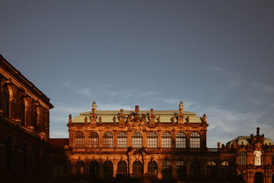 Buildings in city against sky