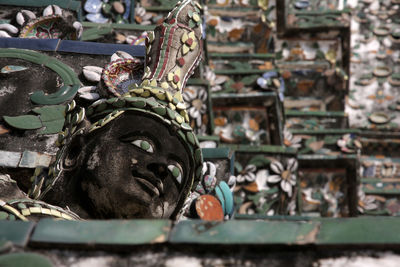 Low angle view of buddha statue in wat phra kaew