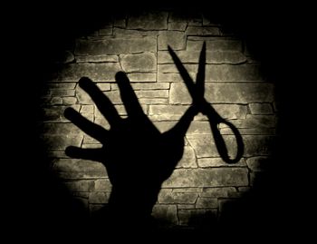 Shadow of hand on silhouette person