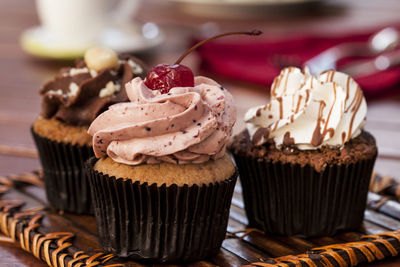 Close-up of cupcakes on table