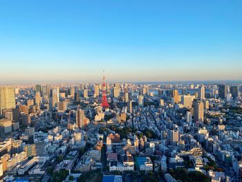 High angle view of buildings in city against clear sky