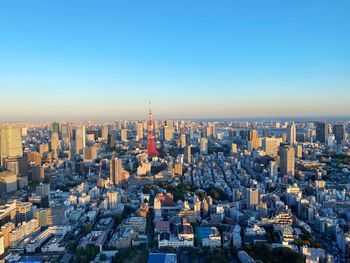 High angle view of buildings in city against clear sky