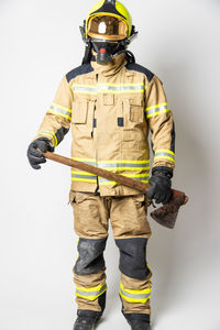 Full length of man standing against white background