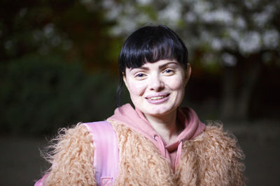 Portrait of a smiling young woman