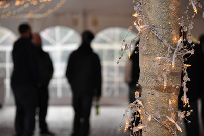 Close-up of men on floor