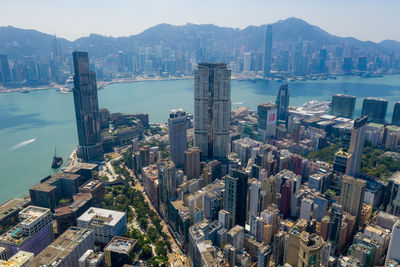 Aerial view of cityscape by bay