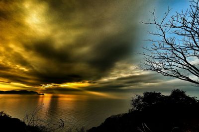 Scenic view of sea against cloudy sky