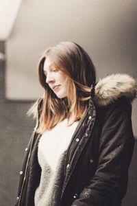 Close-up of young woman standing outdoors