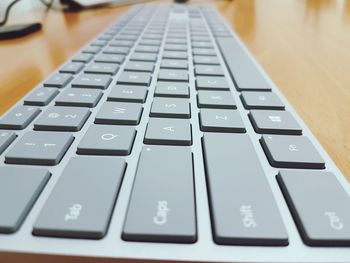 Close-up of computer keyboard on table