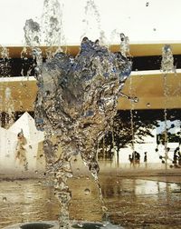 Close-up of water splashing in puddle