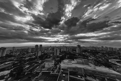 High angle view of buildings in city against sky