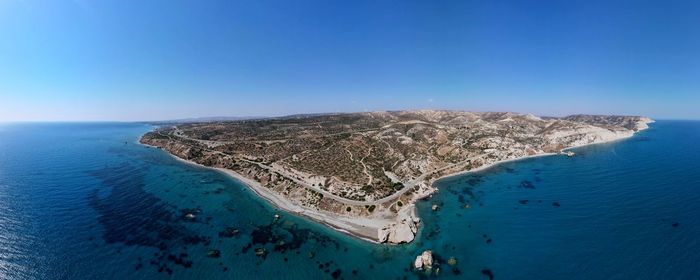 High angle view of sea against clear blue sky