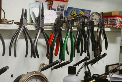 Close-up of clothes hanging on wall