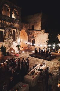People in temple at night