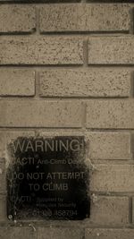 Close-up of text on wall