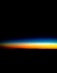 Full frame shot of illuminated lights against black background