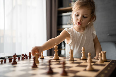 Portrait of boy playing with toy