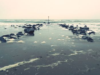 Scenic view of sea against clear sky