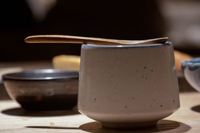 Close-up of coffee cup on table