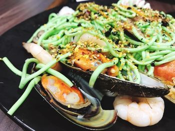 Close-up of seafood served in plate on table