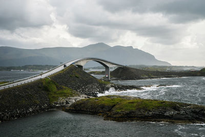 Scenic view of bridge over sea against sky