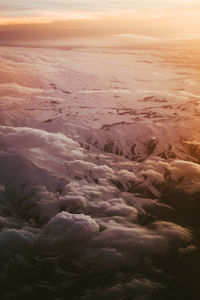 Scenic view of landscape against sky during sunset