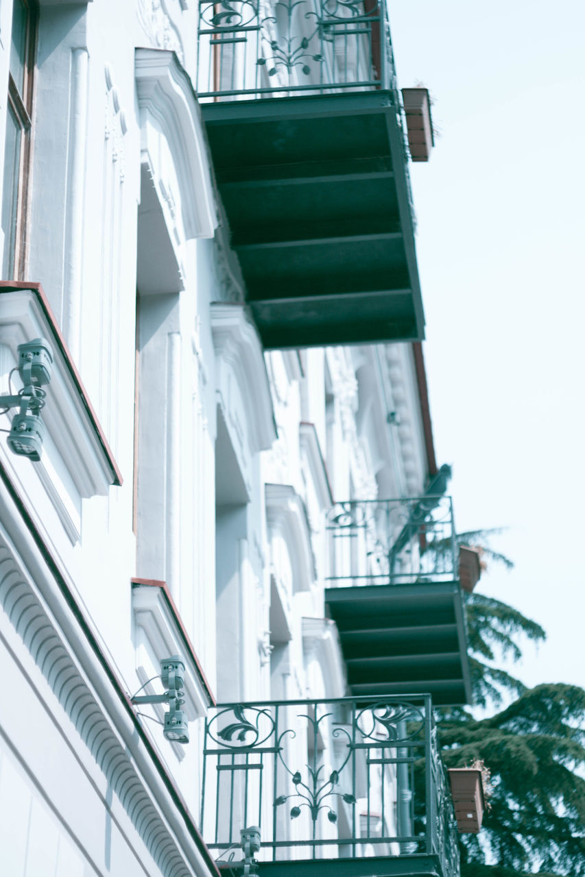 LOW ANGLE VIEW OF SPIRAL STAIRCASE OF BUILDING