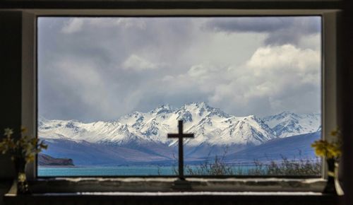 Scenic view of snow covered mountains